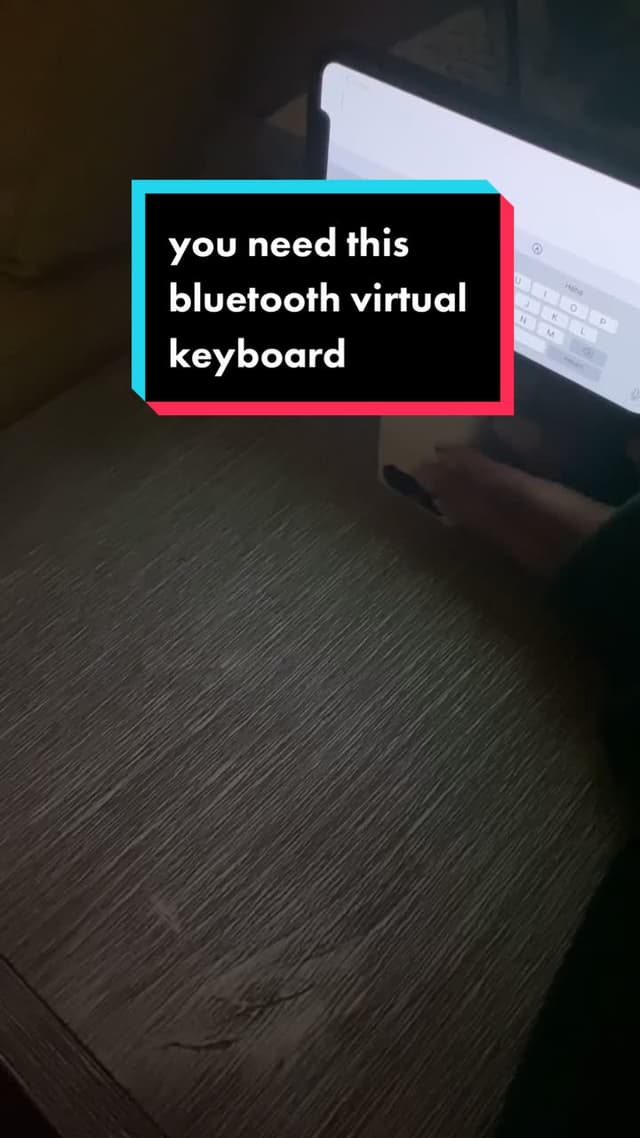 Bluetooth virtual keyboard with a phone stand ⌨️ link in my bio if you want one! #tiktokmademebuyit #tiktokmademebuythis #amazonfinds #amazonmusthave